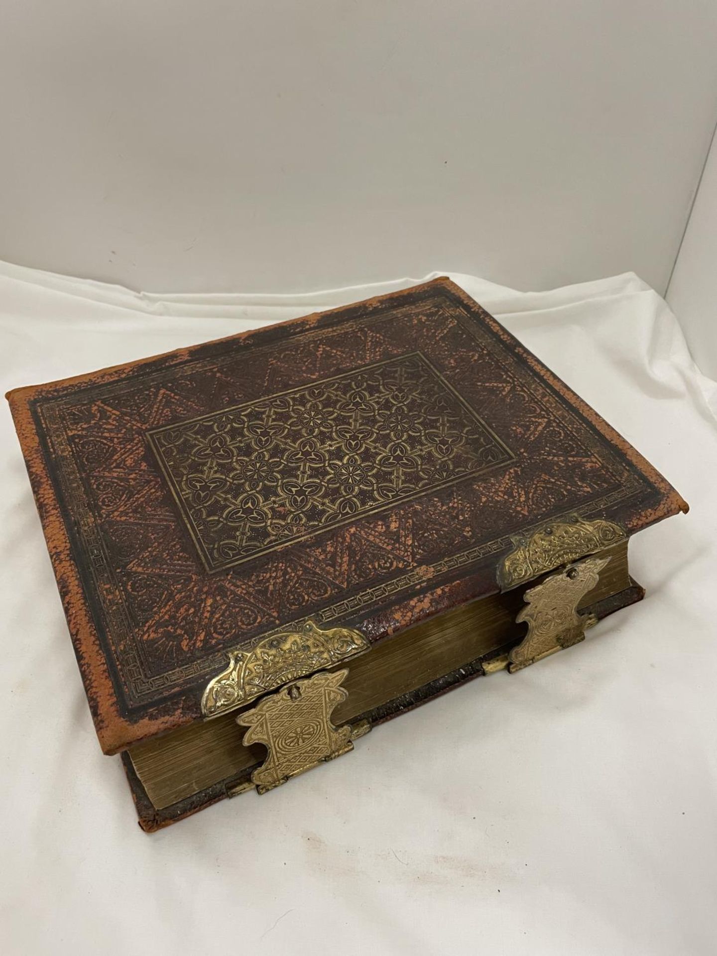 AN 1870'S BIBLE WITH 42 ILLUSTRATED PLATES , GOLD LEAF PAGES AND BRASS CLASPS