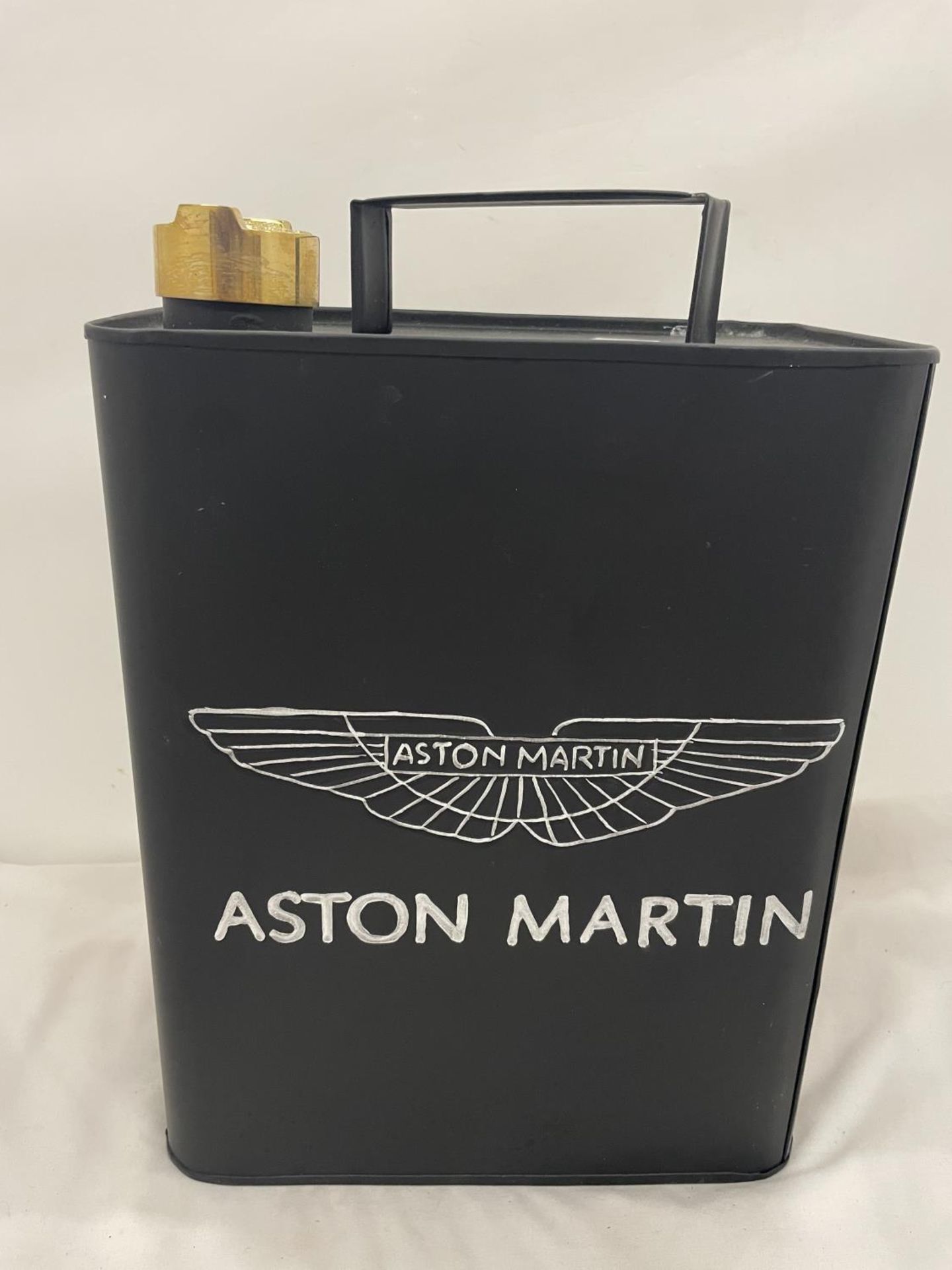 A BLACK ASTON MARTIN PETROL CAN