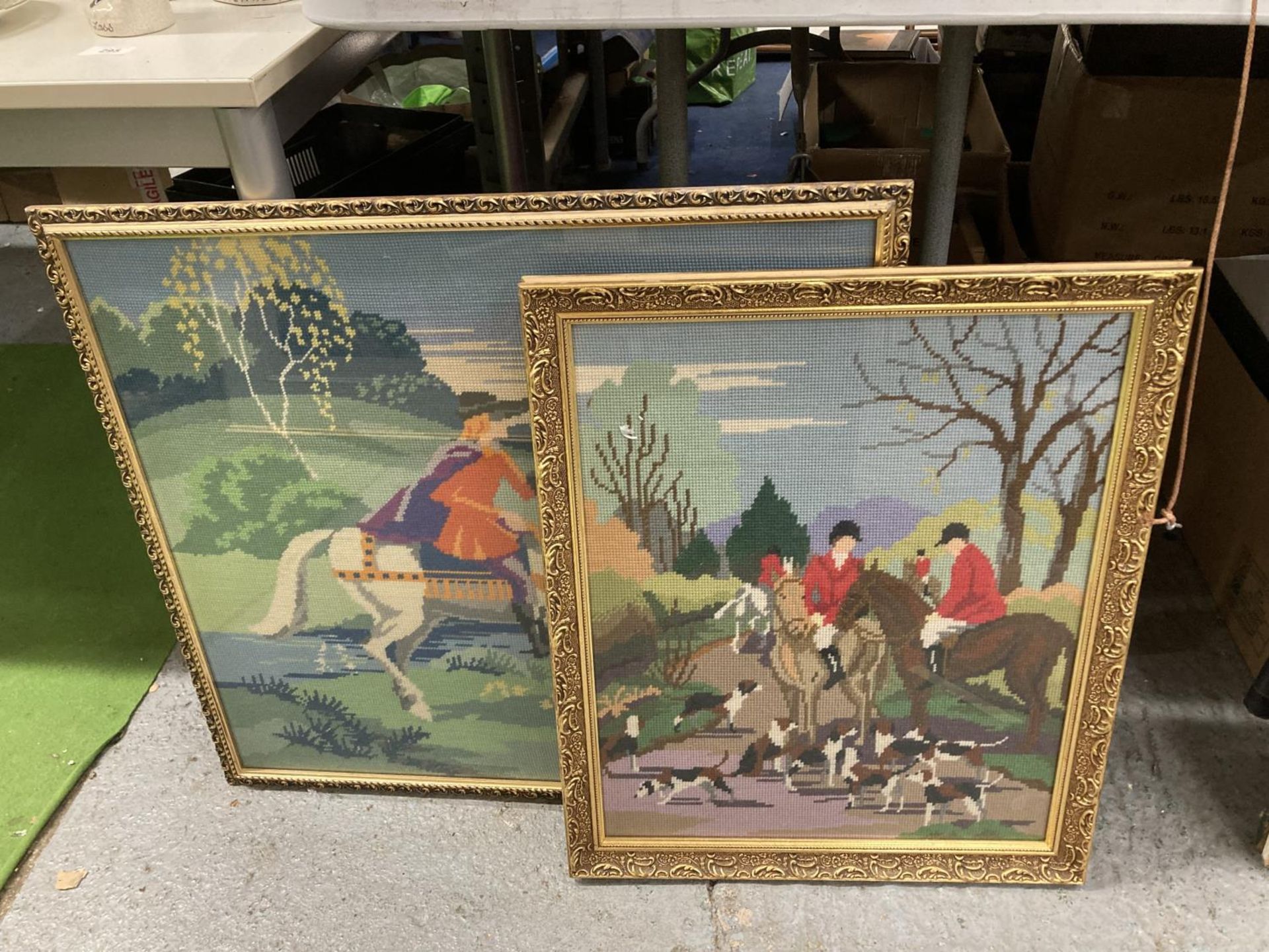 TWO GILT FRAMED WOOLWORK TAPESTRIES, ONE A HUNT SCENE 46CM X 55.5CM, THE OTHER A KNIGHT ON A HORSE