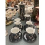 A PORTMEIRION COFFEE SET IN THE 'MAGIC CITY' DESIGN TO INCLUDE COFFEE POT, CREAM JUG, SUGAR BOWL AND