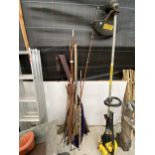 AN ASSORTMENT OF FISHING RODS