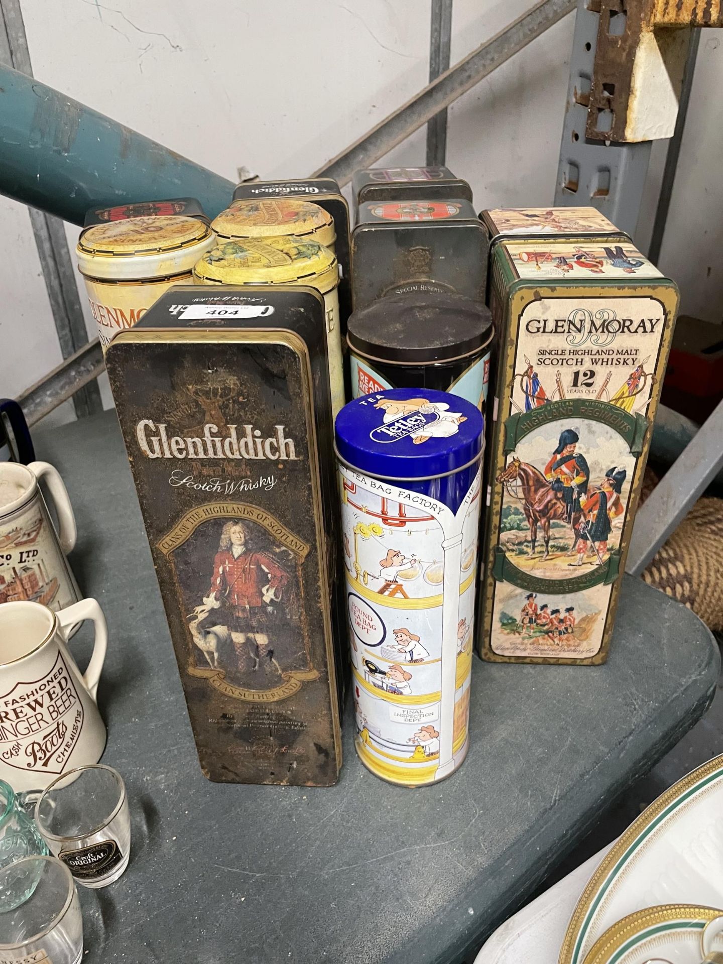 A QUANTITY OF MALT WHISKY TINS TO INCLUDE GLENFIDDICH, GLENMORANGIE, GLEN MORAY, ETC