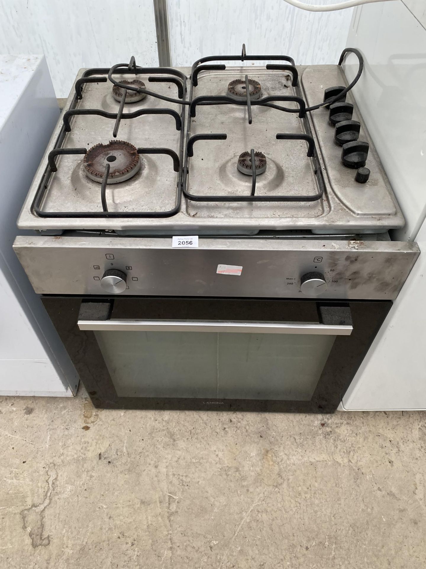 A CHROME AND BLACK LAMONA OVEN AND A HOB