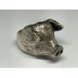 A HEAVY SILVER PIGS HEAD RING