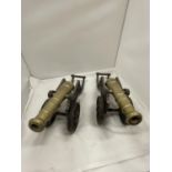 A PAIR OF HEAVY BRASS AND CAST CANNONS