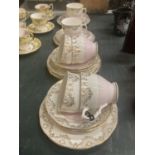 A QUANTITY OF ROYAL YORK CHINA IN A PALE PINK WITH GILT DESIGN TO INCLUDE CUPS, SAUCERS, AND SIDE