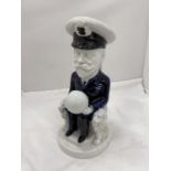 A WILKINSON ROYAL STAFFORDSHIRE POTTERY TOBY JUG KING GEORGE V MODELLED SEATED HOLDING A GLOBE IN