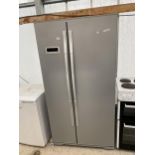 A SILVER BEKO AMERICAN STYLE FRIDGE FREEZER BELIEVED IN WORKING ORDER BUT NO WARRANTY