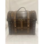 A WOODEN DOMED CASE WITH LEATHER STRAPS 29CM WIDTH, HEIGHT 27CM DEPTH 20CM