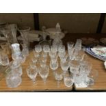 A QUANTITY OF CUT GLASSWARE TO INCLUDE DECANTERS, WINE GLASSES, SHERRY,TUMBLERS, ETC