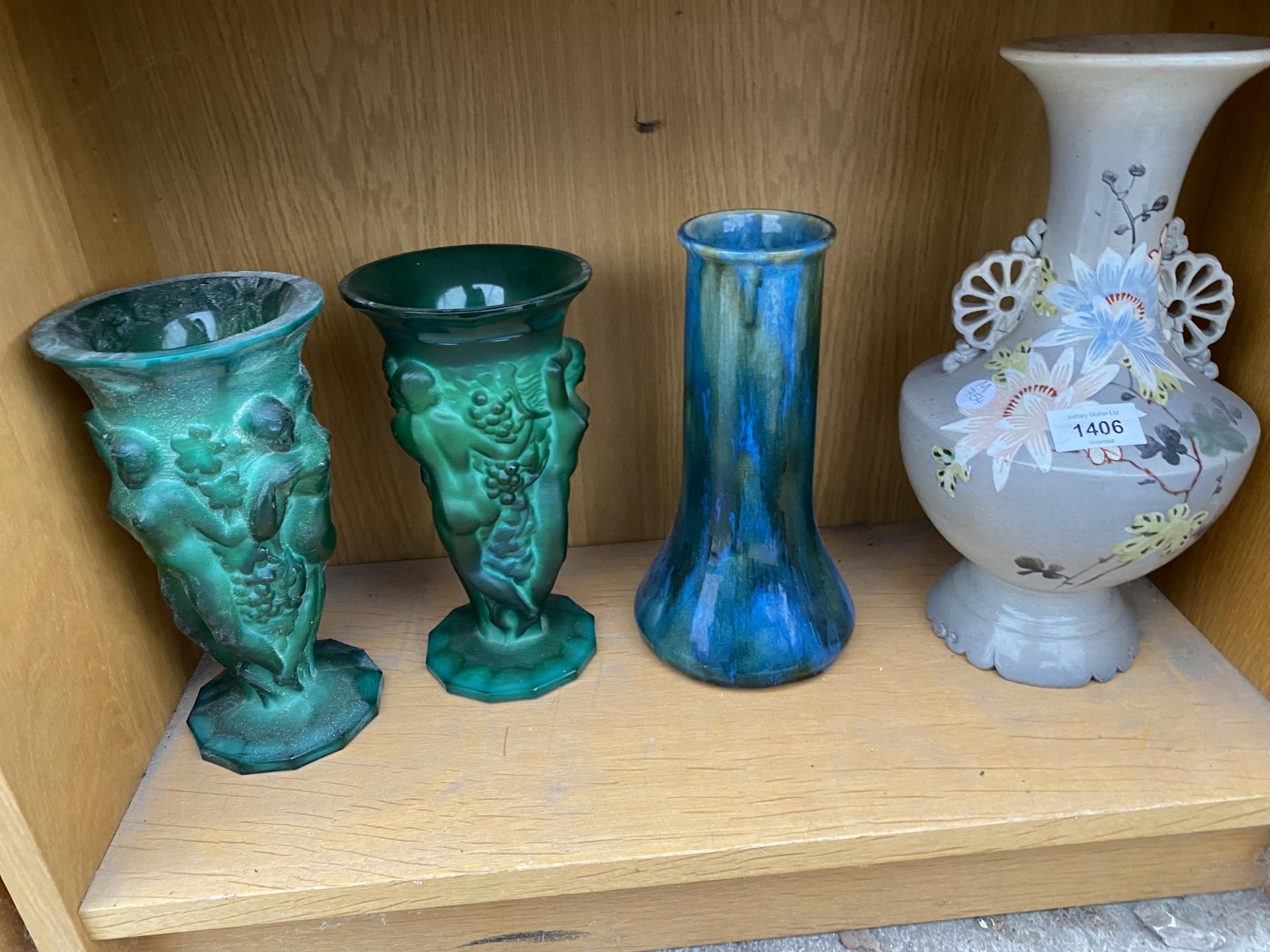 THREE COLOURED GLASS VASES AND A FURTHER CERAMIC VASE