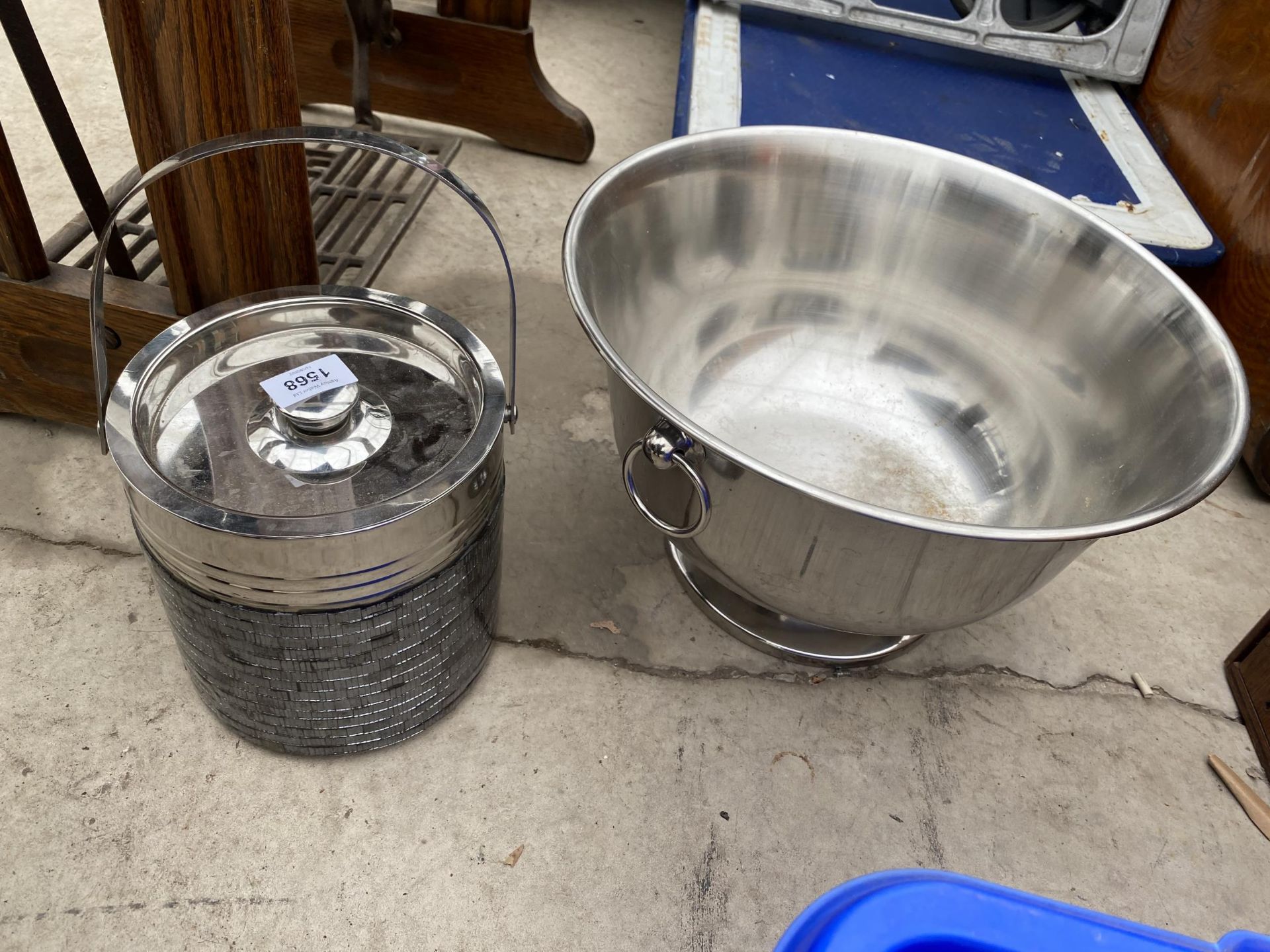 A LARGE ALUMINIUM BOWL AND A METAL ICE BUCKET