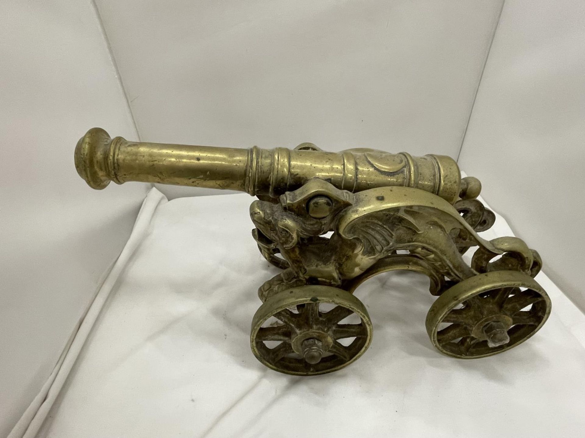 A VERY LARGE HEAVY BRASS CANNON