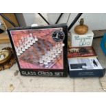 AN ASSORTMENT OF ITEMS TO INCLUDE A GLASS CHESS SET, A TV BRACKET AND OIL BOTTLES ETC