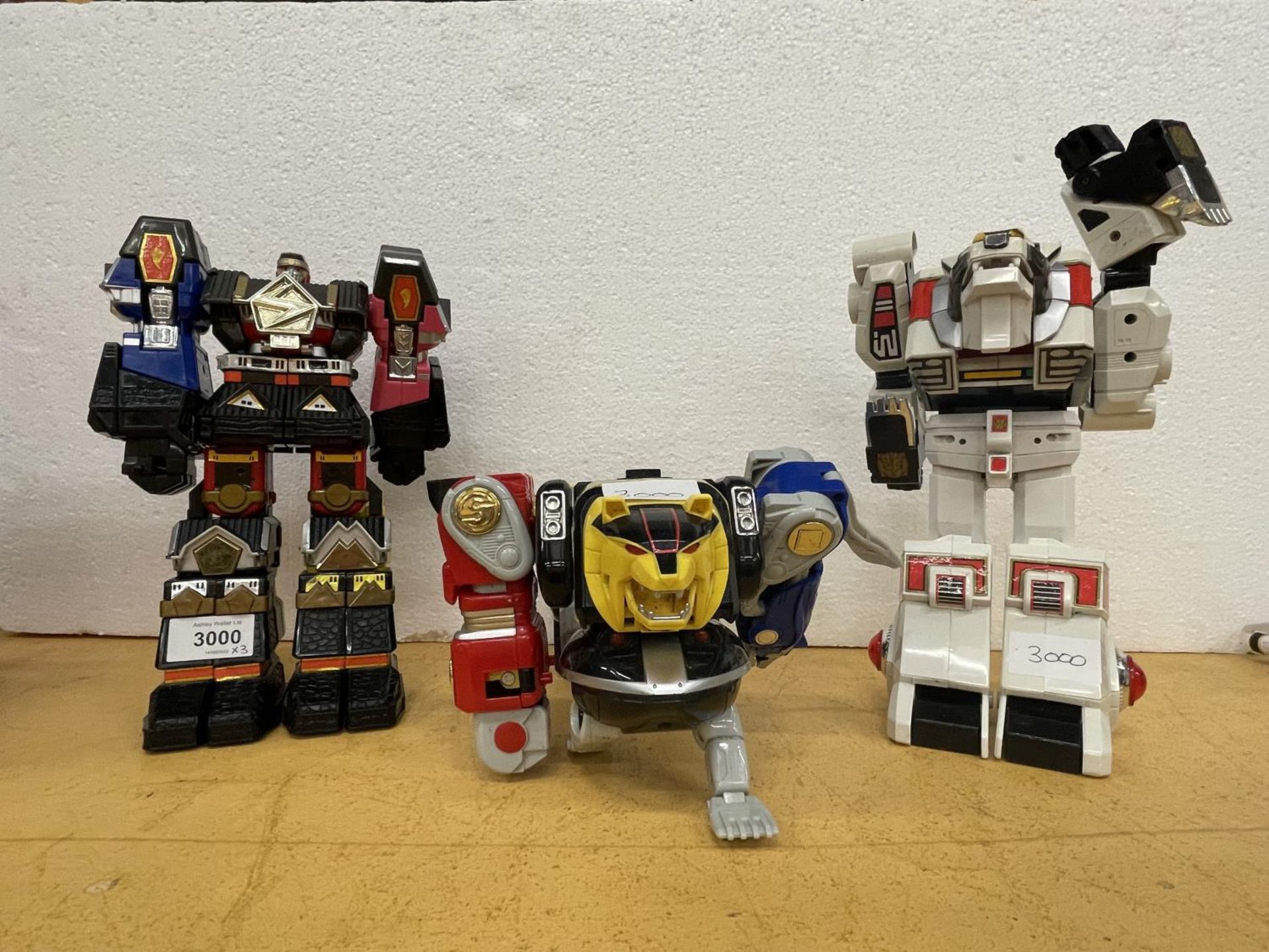 THREE VINTAGE 1990'S POWER RANGERS TRANSFORMERS ALL PROCEEDS FROM THIS LOT ARE BEING KINDLY