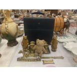 A VINTAGE BLUE CASE TO INCLUDE A BRASS TRAY CONTAINING SIX SMALL GOBLETS, HORSE PLAQUE, CARVED