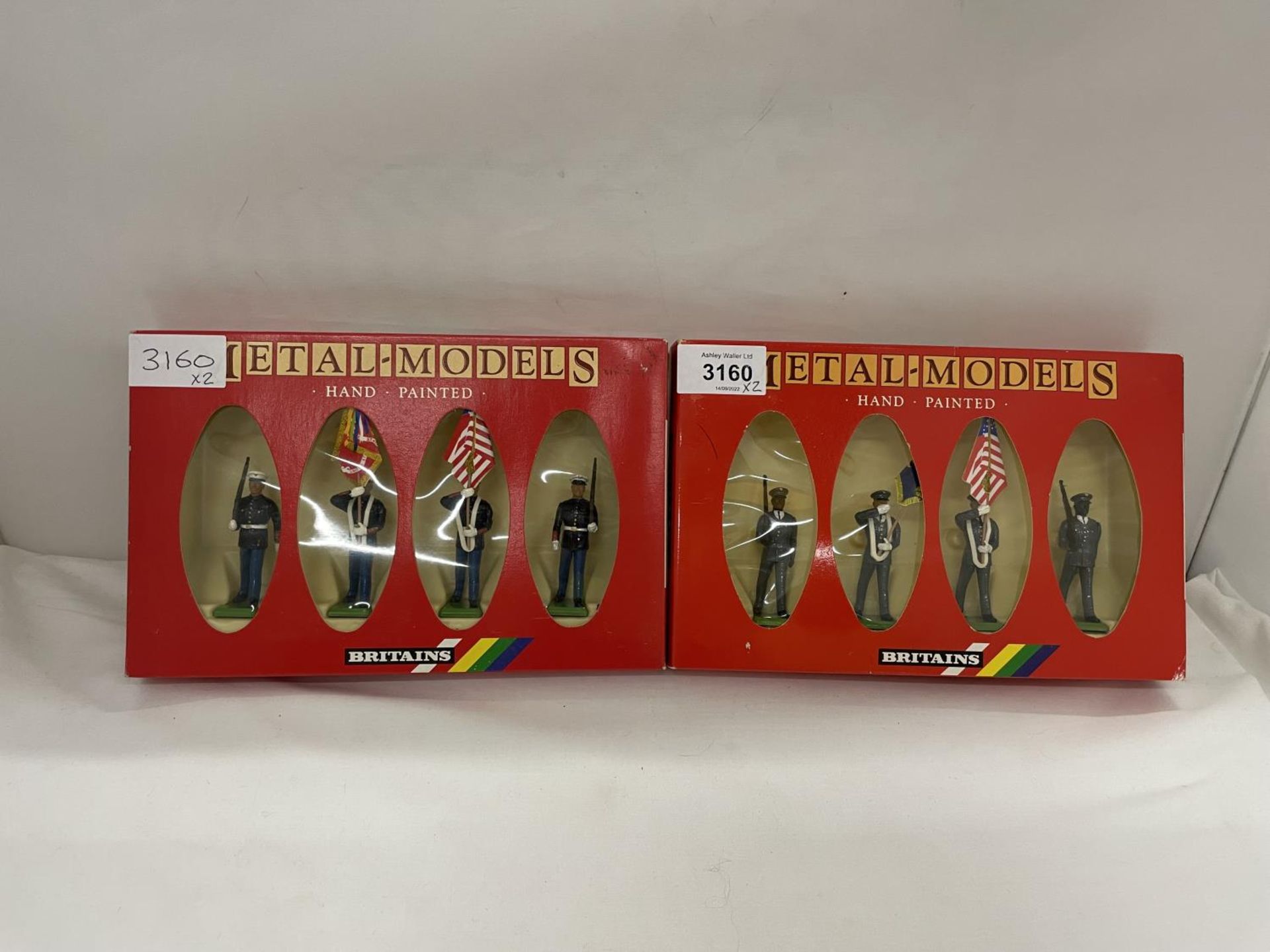 TWO BOXED BRITIANS FOUR PIECE MODEL SOLDIER SETS - US ARMY COLOUR PARTY NUMBER 7306 AND US MARINE