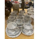 A QUANTITY OF ROYAL ALBERT CUPS, SAUCERS, SIDE PLATES PLUS A SUGAR BOWL AND CREAM JUG