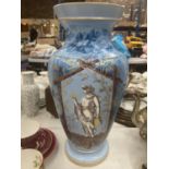 A LARGE VASE IN PALE BLUE WITH A CLASSICAL FIGURE TO THE FRONT, FLOWERS AND GILT TO THE BODY AND