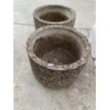 TWO LARGE ROUND RECONSTITUTED STONE PLANTERS
