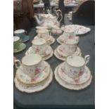 A ROYAL ALBERT 'TENDERNESS' TEASET TO INCLUDE TEAPOT, CAKE PLATE, CREAM JUG, SUGAR BOWL, CUPS,