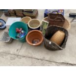 AN ASSORTMENT OF ITEMS TO INCLUDE WICKER BASKETS, PLANT POTS AND A METAL BATH ETC