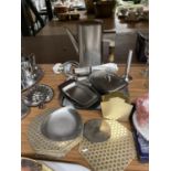 A QUANTITY OF STAINLESS STEEL ITEMS TO INCLUDE A KETTLE, BUTTER DISH, TRAY, PLACE MATS, ETC