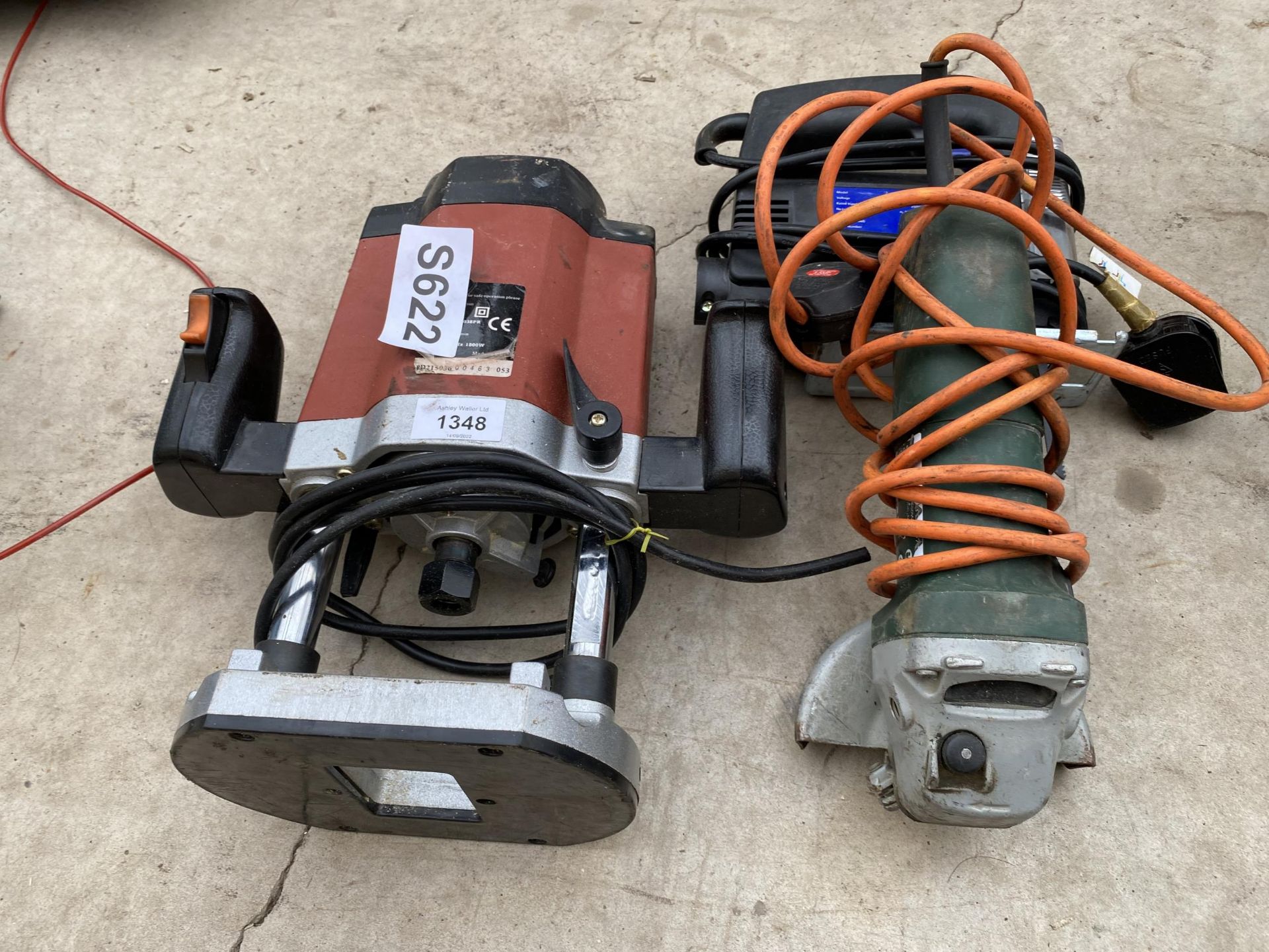 THREE POWER TOOLS TO INCLUDE A ROUTER AND AN ANGLE GRINDER ETC