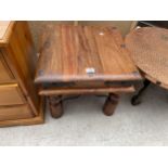 A MODERN INDIAN HARDWOOD LAMP TABLE WITH IRON WORK STUDS AND SUPPORTS, 18" SQUARE
