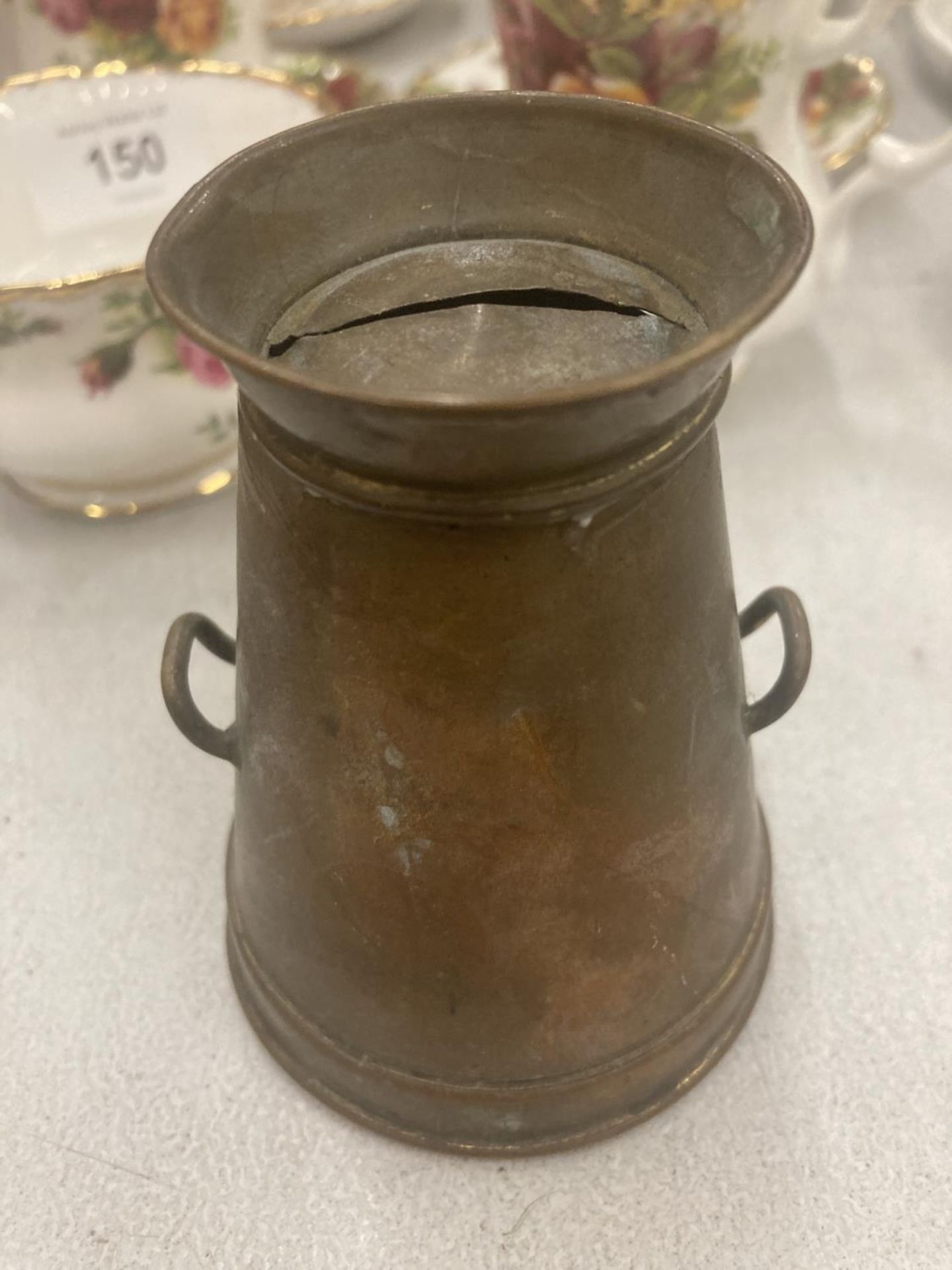 A VINTAGE COPPER MONEY BOX IN THE SHAPE OF A MILK CHURN HEIGHT 9CM