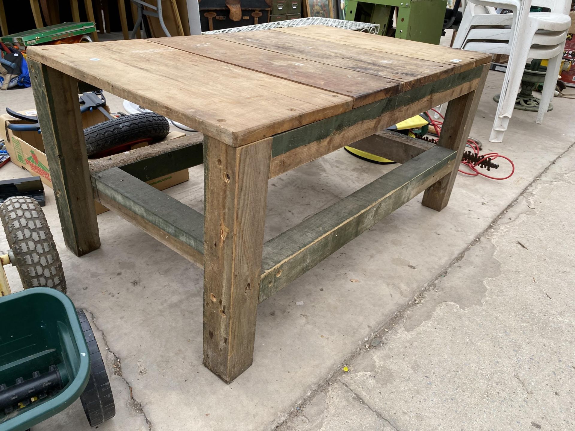 A WOODEN PLANK TOP OUTDOOR COFFEE TABLE - Image 2 of 2