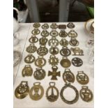 A LARGE COLLECTION OF VINTAGE HORSE BRASSES - 35 IN TOTAL