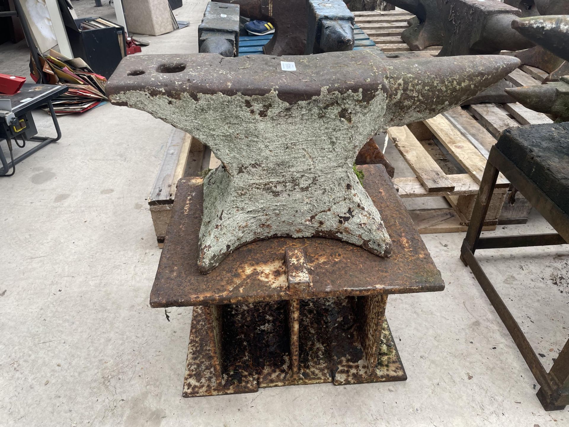 A VINTAGE BLACKSMITHS ANVIL ON A STAND LENGTH 63CM