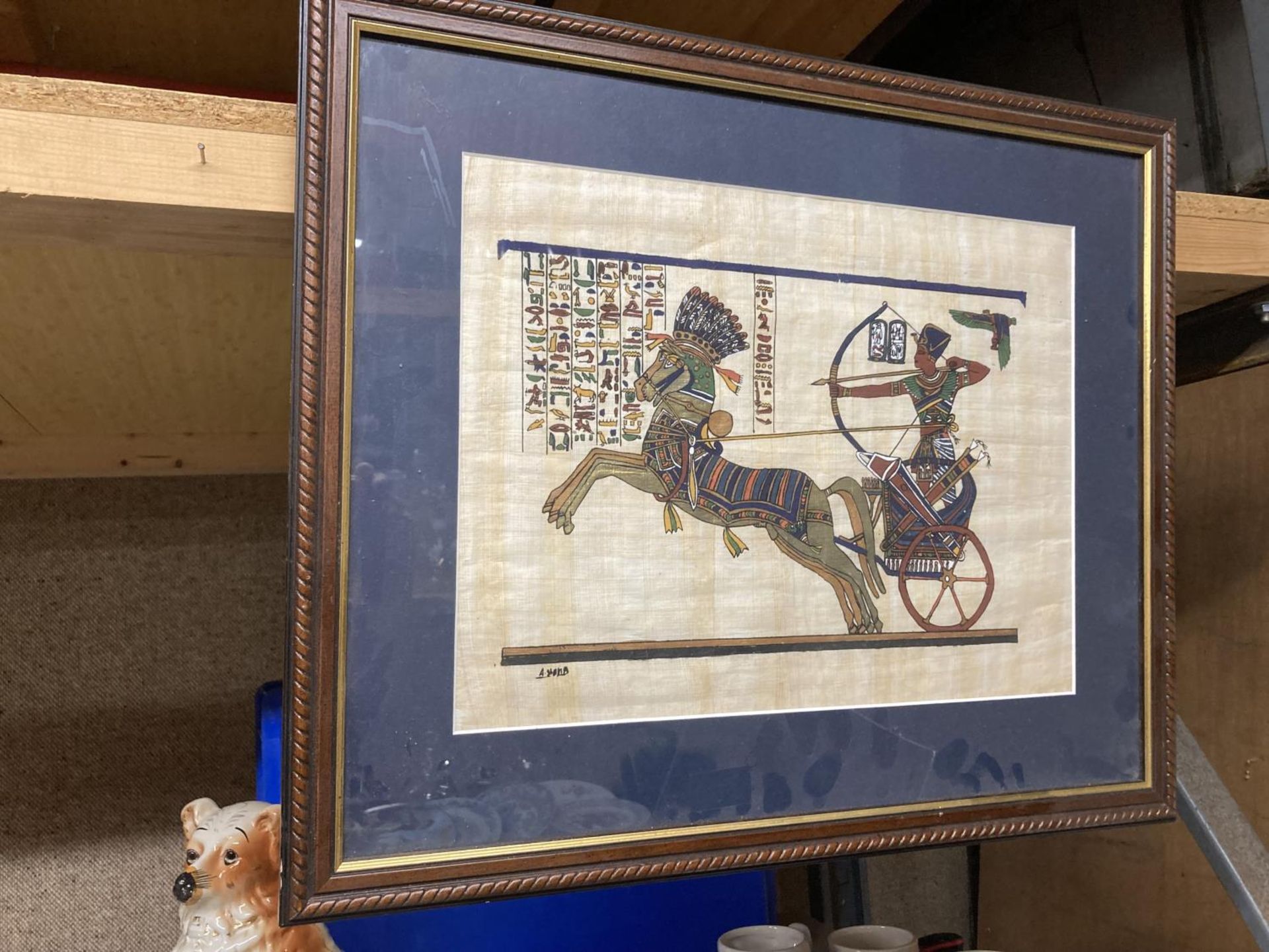A FRAMED EGYPTIAN PICTURE ON PAPYRUS