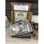 AN ASSORTMENT OF FRAMED PRINTS AND STAINLESS STEEL COOKING TRAYS