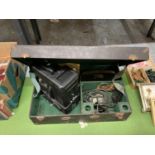 A VINTAGE DITMAR FILM PROJECTOR IN A CASE WITH INSTRUCTIONS AND ANCILLARIES