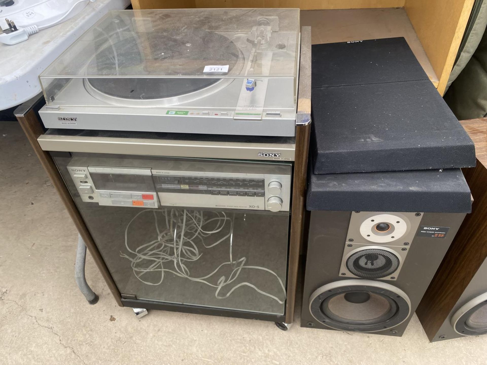 A SONY PS-LX5 RECORD PLAYER, A SONY STEREO DECK RECIEVER AND TWO SPEAKERS