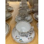 FIVE GROSVENOR CHINA CUPS, SAUCERS AND FOUR SIDE PLATES WITH A BIRD AND FLORAL DESIGN