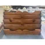 A MAHOGANY LETTER RACK WITH SHAPED TOP HEIGHT 23CM, LENGTH 38.5CM