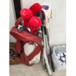 A GOLF BAG AND GOLF CLUBS TO INCLUDE PING AND TAYLOR MADE ETC