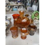 A QUANTITY OF AMBER COLOURED GLASSWARE TO INCLUDE A LARGE BOWL, JUGS, VASES, ETC