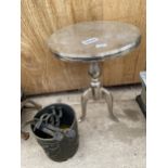 A METAL TABLE, FOUR CAST IRON BRACKETS AND A DECORATIVE CAST IRON BUCKET