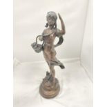 A BRONZE STYLE FIGURE OF A LADY WITH A BASKET HEIGHT 45CM