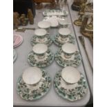 A GLADSTONE 'MONTROSE' CHINA TEASET WITH A FLORAL DESIGN TO INCLUDE CAKE PLATE, SANDWICH TRAY, CREAM