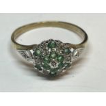 A HALLMARKED 9CT GOLD DIAMOND AND EMERALD RING WITH PRESENTATION BOX SIZE Q