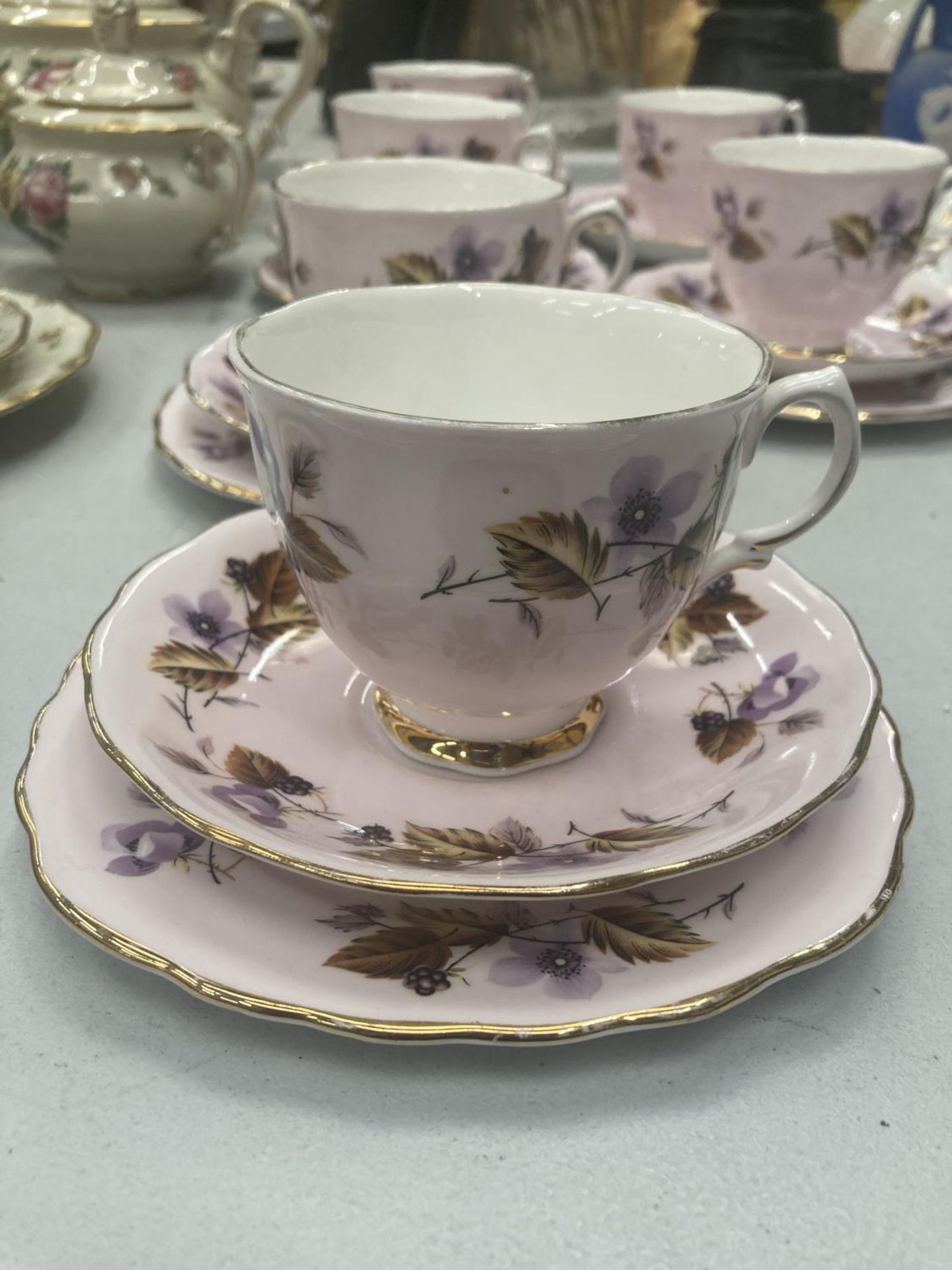 FIVE COLCLOUGH TRIOS IN LILAC WITH BLACKBERRY PATTERN PLUS A CUP AND SAUCER - Image 2 of 4