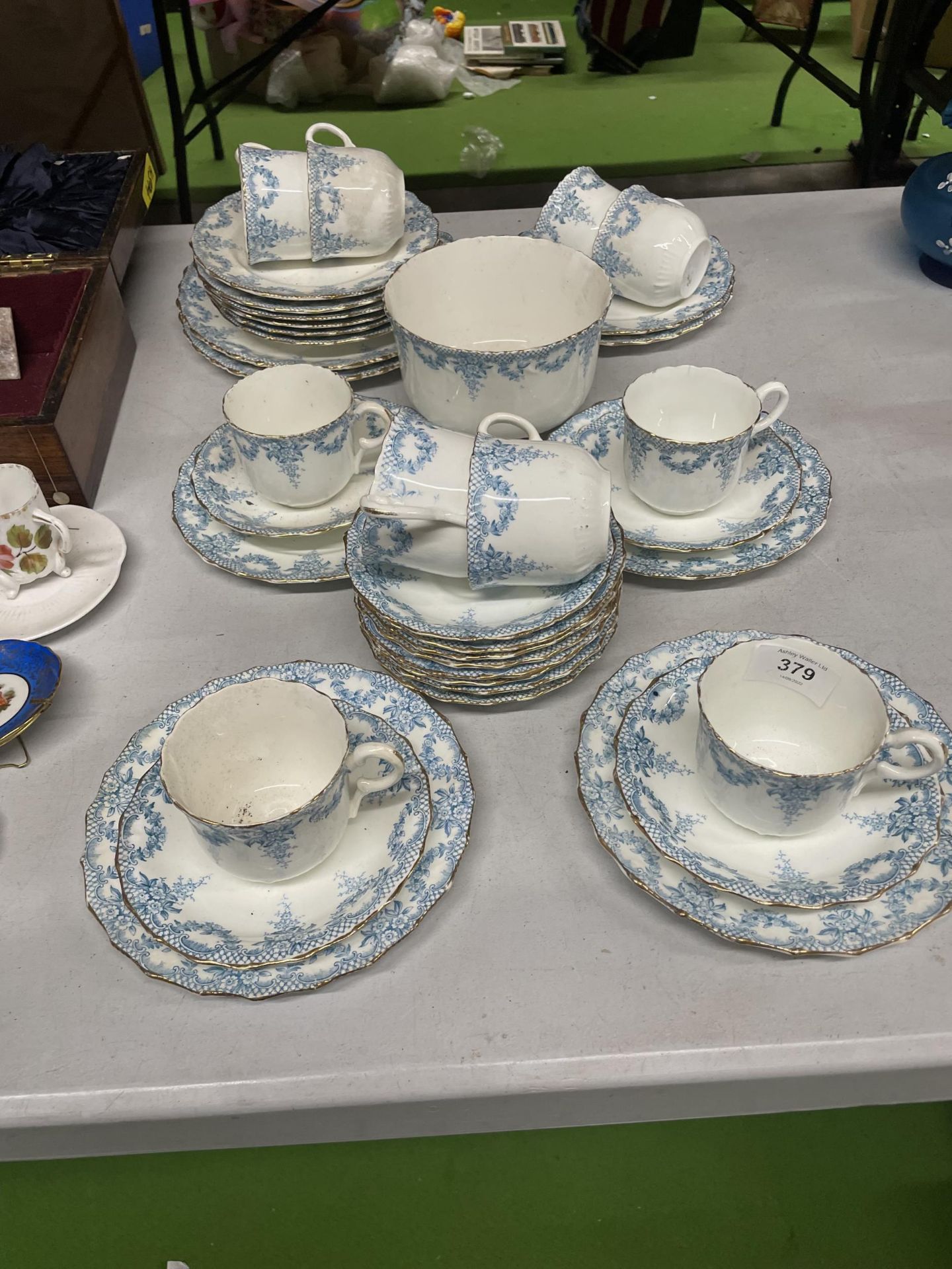 A QUANTITY OF BLUE AND WHITE CHINA TO INCLUDE CUPS, SAUCERS, SIDE PLATES, SUGAR BOWL, ETC