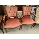 A PAIR CONTINENTAL STYLE OPEN ARM CHAIRS