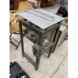 AN ELECTRIC TABLE SAW WITH MOTOR