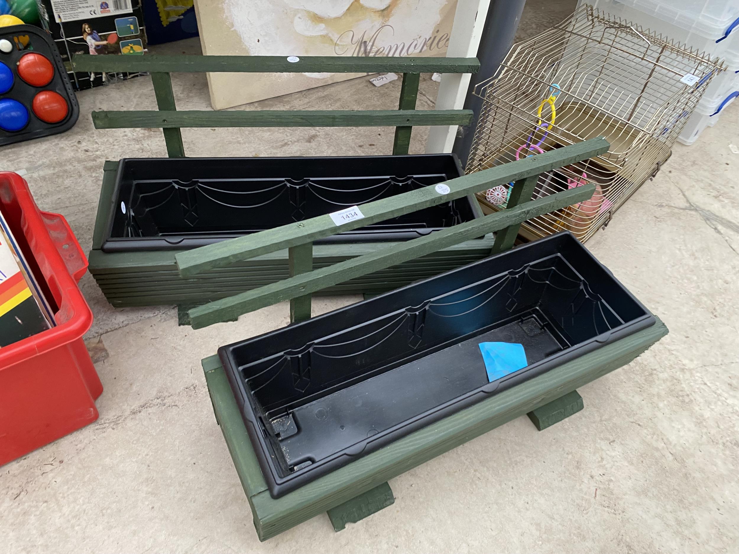 TWO WOODEN TROUGH PLANTERS WITH PLASTIC INSERTS